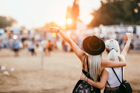 Two friends enjoying the festival